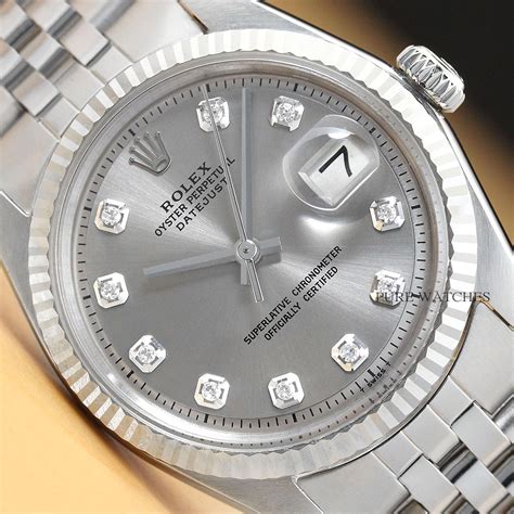 1996 rolex grey dail set with diamonds